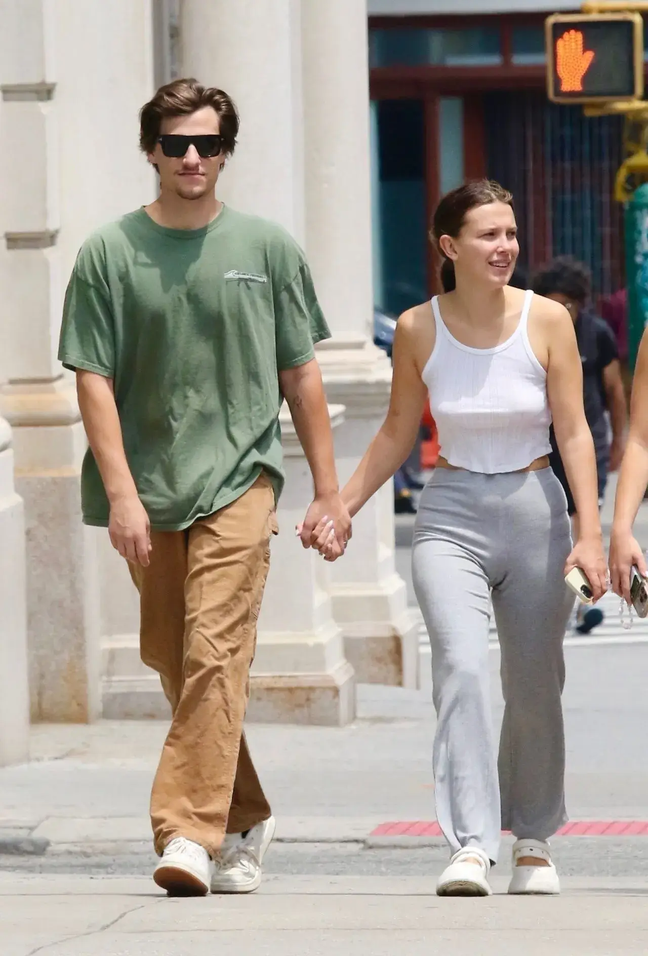 Millie Bobby Brown Stills in White Top Blue jeans in New York